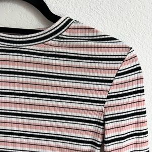 A pink,black and white long sleeve shirt from Shein.